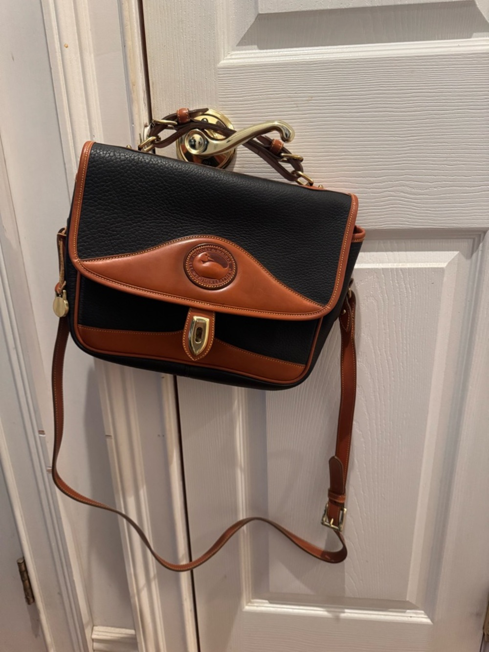 Dooney & Bourke Black and Brown Leather Satchel with Gold Hardware